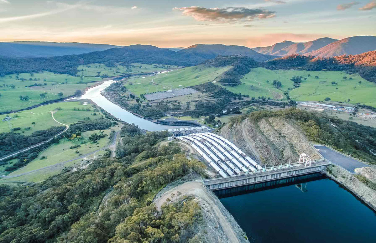 Huge pipes of Tumut hydroelectric power station at sunset Huge pipes of Tumut hydroelectric power station at sunset